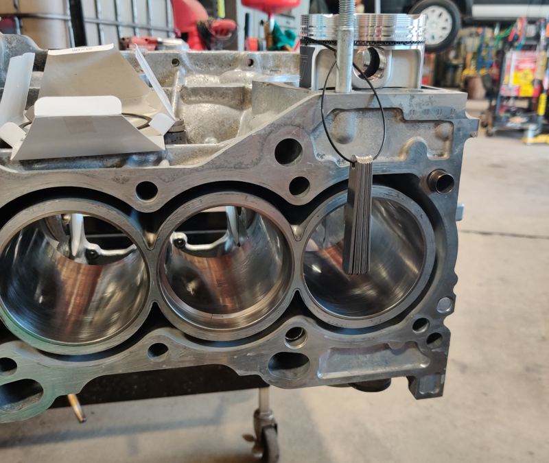 Honda K20 block on a stand with the cylinders exposed